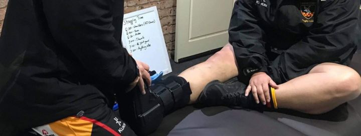 Fitting a boot on an ankle injury