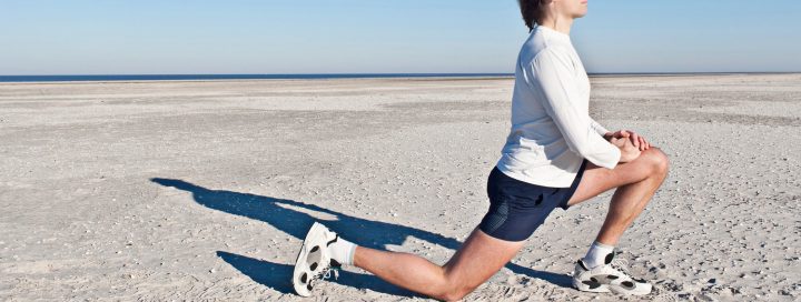 Man stretch on beach